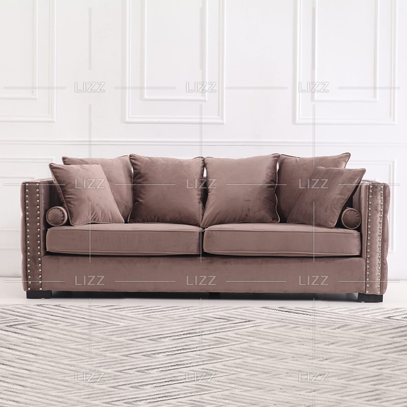 Cómodo sofá moderno de tela Chesterfield