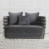 Sofá de tela gris de lujo con estructura de metal