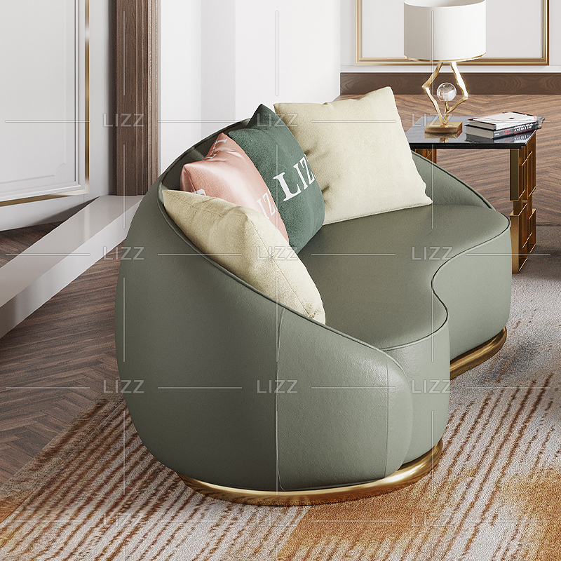 Sofá americano enorme verde de la sala de estar