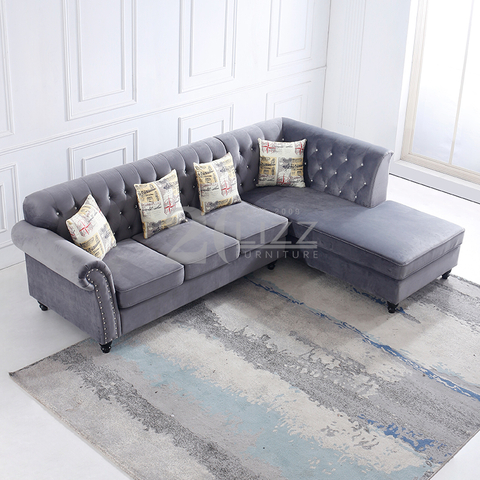Sofá de sala de estar de tela Chesterfield con chaise longue